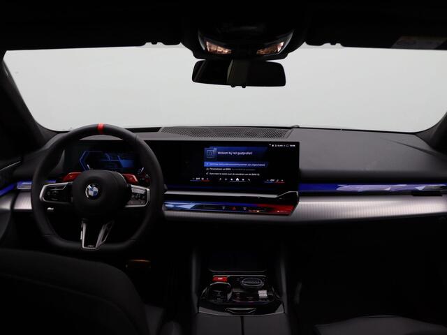BMW M5 5 Serie Touring Stuurwielrand verwarmd | M Drive Professional | Trekhaak | Panoramadak | Driving Assistant Professional | Parking Assistant Professional | Bowers & Wilkins | 20/21''