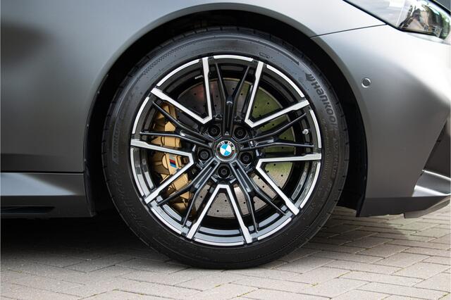 BMW M5 Touring 727PK | Keramische | NL Auto | BTW | M Drivers Package | ACC | Bowers & Wilkins | Lane & Side Assist | 360 Camera | Carbon | Led | E.TH 2000kg | Panoramadak | Fabrieksgarantie 2028 | BMW Individual Frozen Deep Grey Metallic | Driving Assistant Professional | Memory | Led | Ventilatie + Stuurverwarming | Stoelverwarming 4X | Iconic Gl