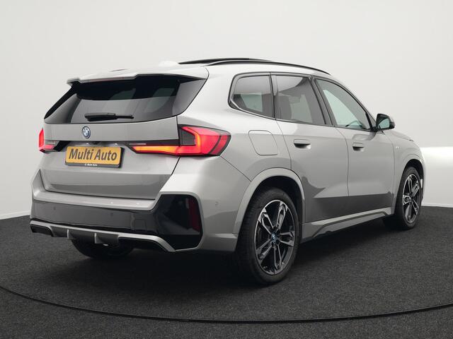 BMW X1 xDrive30e M Sport Plug In Hybrid 326pk PHEV | Trekhaak af Fabriek | Panodak | Adaptive Cruise | Widescreen Navi | 360 Camera | Alcantara Sportstoelen Massage & Memory | Harman Kardon |