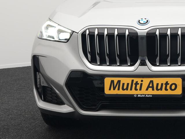 BMW X1 xDrive30e M Sport Plug In Hybrid 326pk PHEV | Trekhaak af Fabriek | Panodak | Adaptive Cruise | Widescreen Navi | 360 Camera | Alcantara Sportstoelen Massage & Memory | Harman Kardon |