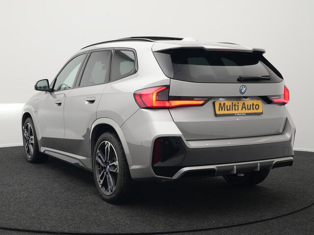 BMW X1 xDrive30e M Sport Plug In Hybrid 326pk PHEV | Trekhaak af Fabriek | Panodak | Adaptive Cruise | Widescreen Navi | 360 Camera | Alcantara Sportstoelen Massage & Memory | Harman Kardon |