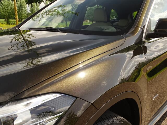 BMW X1 xDrive25i Centennial High Executive | Trekhk | HUD | NAV | 18inch | Uniek!