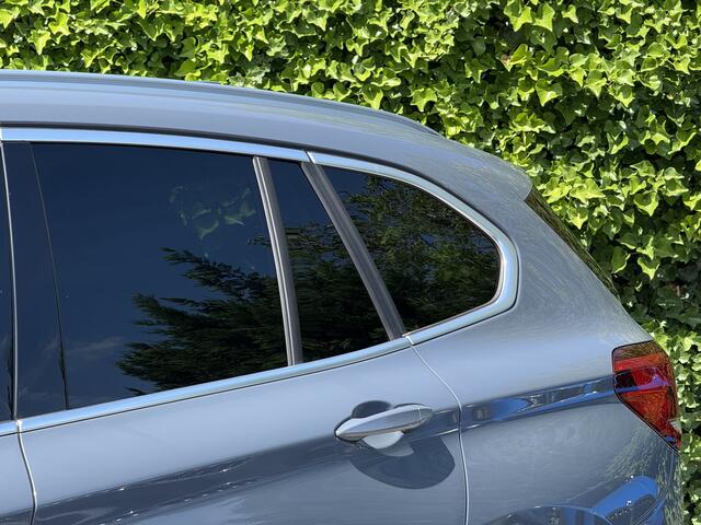 BMW X1 sDrive20i | Panorama | Driving ass. Plus | Camera | Head up | Getint glas | HiFi