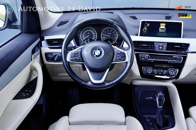 BMW X1 sDrive20i 192 pk HIGH EXECUTIVE AUTOMAAT / GROTE BEURT + NIEUWE APK / LEDER / HEAD-UP DISPLAY / NAVIGATIE PLUS / CENTENNIAL / LED-KOPLAMPEN / SPORTSTOELEN / ALARM / CRUISE CONTROL / ISOFIX