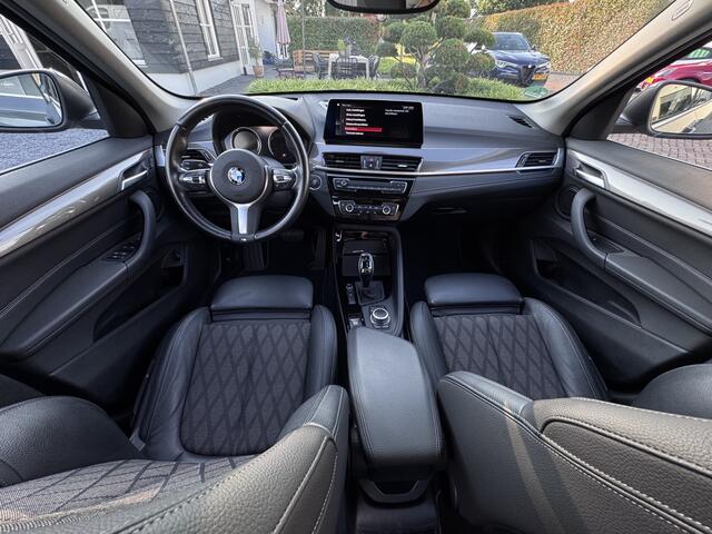 BMW X1 sDrive20i X-Line | HUD | NAV-prof | Leer | 18inch | Eleksp. | Stoelverw.