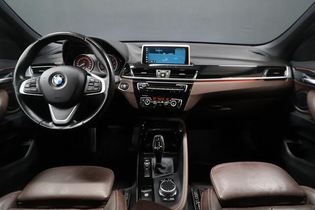 BMW X1 sDrive20i High Executive [MEMORY SEATS, HEAD-UP DISPLAY, VOL LEDER, STOELVERWARMING, AUTOMATISCHE AIRCO, AUTOMATISCHE ACHTERKLEP, NAVIGATIE, CRUISE CONTROL, NIEUWSTAAT]
