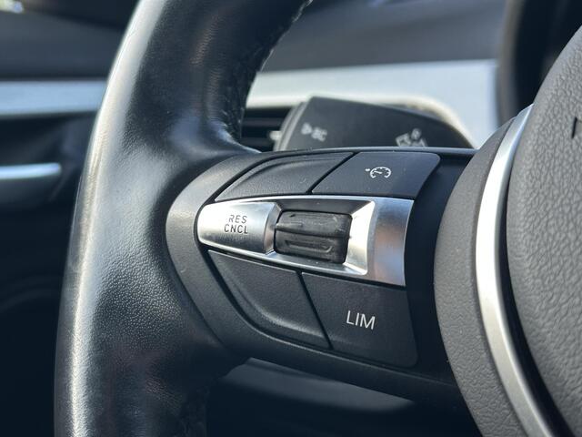 BMW X1 sDrive20i High Executive l Sfeer verlichting l Navi l Trekhaak l Electrische Klep