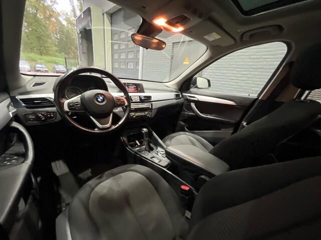 BMW X1 sDrive18i Centennial High Executive | Automaat | Panoramadak | PDC V+A | 17 Inch