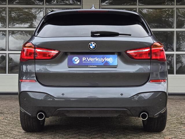 BMW X1 sDrive20i M SPORT | LEDER | TREKHAAK | NAVIGATIE | STOEL- STUURWIELVERWARMING | ELEKTR. KOFFERKLEP |