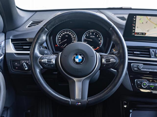 BMW X1 sDrive20i | Orange Edition | Business Edition Plus | Head-Up Display | Trekhaak | Verwarmd Stuurwiel