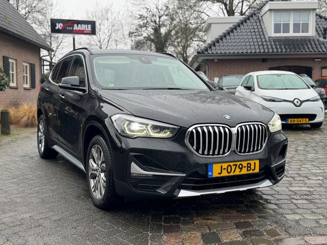 BMW X1 sDrive 2.0i 192pk autom ecc,beigeleer,lmv,navi,led,chroom,dglas,camera