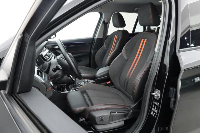 BMW X1 sDrive20i 192PK High Executive - Automaat | Afn. Trekhaak | Nav | Cruise | ACC | Led | Elek. Klep | Sfeerverl. | PDC | 1800kg trekg. V