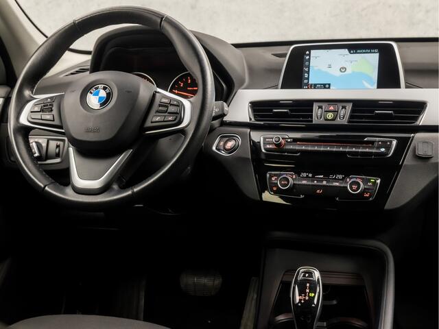 BMW X1 sDrive18i Sport 141Pk Automaat (NAVIGATIE, CLIMATE, PARKEERSENSOREN, SPORTSTOELEN, GETINT GLAS, CRUISE, XENON, NIEUWSTAAT)