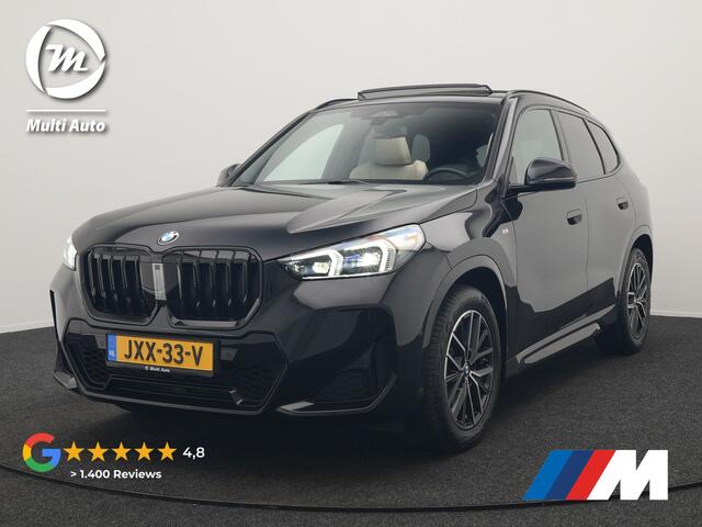 BMW X1 sDrive20i M Sport 170pk Dealer O.H. | Panodak | Lederen Sportstoelen Verwarmd | Adaptive M Onderstel | Widescreen Navi | Camera | Keyless | Adaptive LED | Sfeerverlichting | Apple Carplay | Navigatie | DAB |