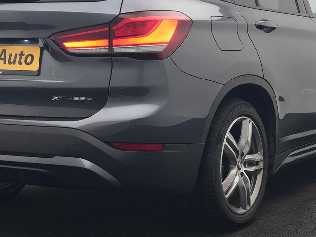 BMW X1 xDrive25e Sportline Plug in Hybrid 222pk Dealer O.H PHEV | Trekhaak Afn. | Panodak | Head Up | Lederen Sportstoelen Memory & Verwarmd | Camera | Apple Carplay | Keyless | Sfeerverlichting | Navigatie | DAB |