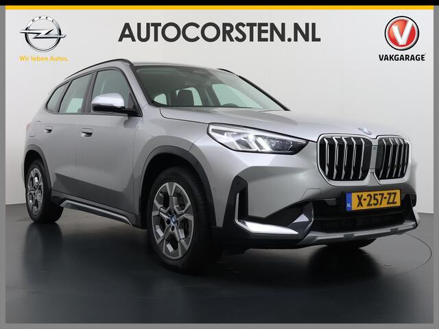 BMW X1 xDrive25e 4WD Hybride 245pk AUT-7 Leder Trekhaak LED Adap.Cruise Camera Navi Sportstoelen Dual-Ecc ParkAssist PDC Apple Carplay Android Lmv Elek.Achterklep ConnectDrive Isofix DAB Led Regen-Lichtsensor Lane Assist Wifi AWD 1.700KG Trekgewicht 1e Eigenaar 