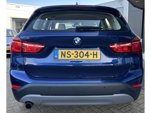 BMW X1 sDrive18i High Executive | NL AUTO | Automaat | Achteruitrijcamera | Navigatie | Parkeersensoren Voor en Achter | Lederen Bekleding | Stoelverwarming | Elektrische Achterklep | 2 Sleutels |
