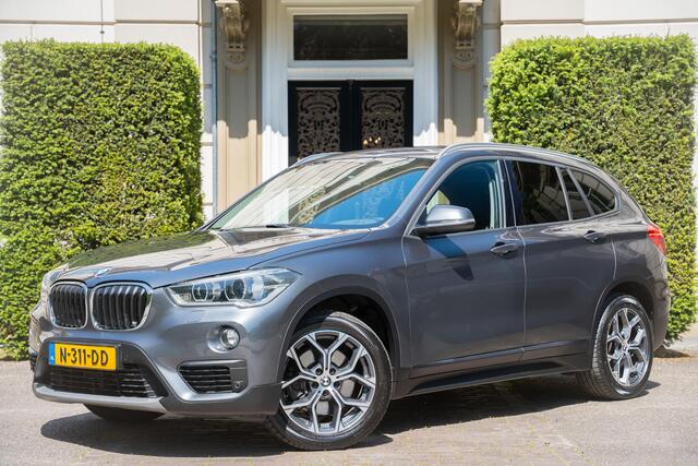 BMW X1 xDrive20i High Executive TREKHAAK | PANO | ADAPTIVE | KEYLESS | CAMERA | STUURVERW