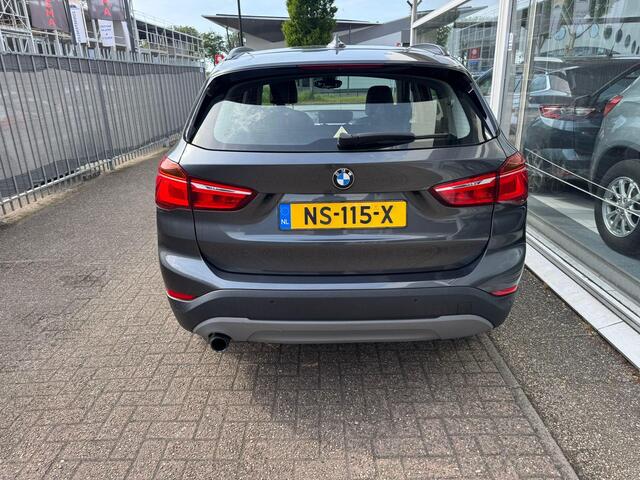 BMW X1 sDrive18i High Executive | 1e eigenaar | Automaat | Afneembare trekhaak | Airco | Elektrische ramen | Navigatie | Nieuwe APK | NAP |