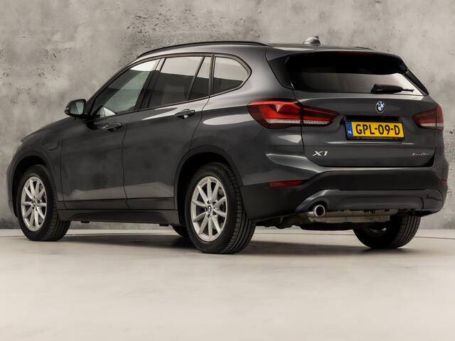 BMW X1 xDrive25e High Executive 221Pk Automaat (GROOT NAVI, CLIMATE, STOELVERWARMING, GETINT GLAS, SPORTSTOELEN, CAMERA, ELEK ACHTERKLEP, NIEUWE APK, NIEUWSTAAT)