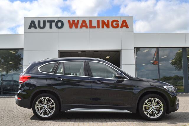 BMW X1 sDrive18i Panaramadak | Leer | Head up | Trekhaak 1700kg | Dealer onderhouden.