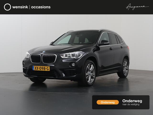 BMW X1 sDrive18i Executive Sport Edition | 1700kg trekgewicht | Trekhaak | Stoelverwarming | HUD | Navigatie | Cruise control | Achteruitrijcamera | Sportstoelen |