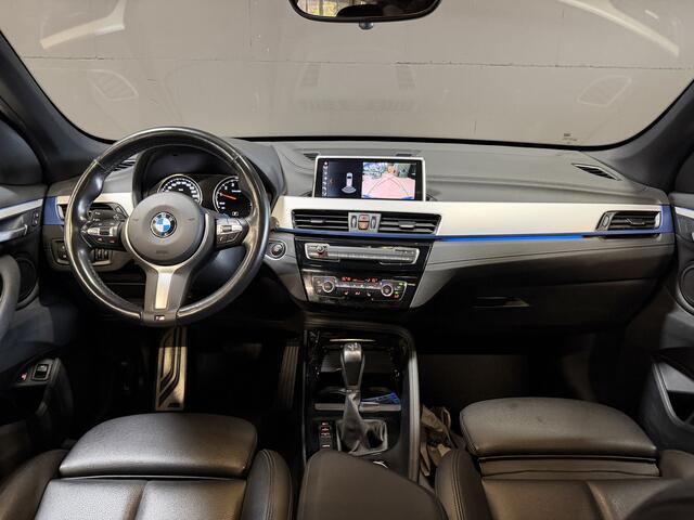 BMW X1 xDrive25e High Executive | M-pakket | Camera | Afn. trekhaak | Leder | Sfeerverlichting | Full LED