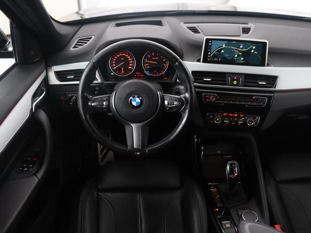 BMW X1 sDrive20i High Executive M-sport | Leder | Memory | Harman/Kardon | Head-up | Cruise control | Stoelverwarming | Climate control | Navigatie | Bluetooth | Park assist | Elektrische achterklep