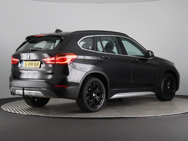 BMW X1 sDrive18i High Executive (Afn. Trekhaak / Carplay / Camera / Cruise / Navi / Stoelverw.)