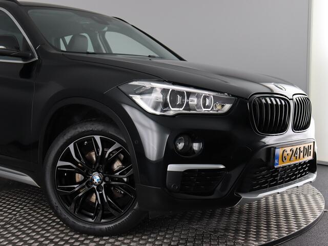 BMW X1 sDrive18i High Executive (Afn. Trekhaak / Carplay / Camera / Cruise / Navi / Stoelverw.)