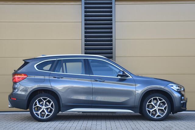 BMW X1 sDrive20i Orange Edition II * X-Line * Head-Up * Sportstoel * LED * Lichtpakket * Achteruitrijcamera *