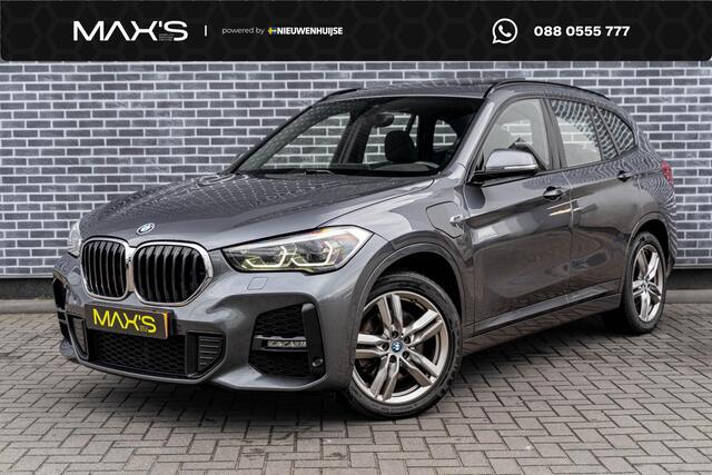 BMW X1 xDrive25e High Executive | M-Sport | Plug-in Hybrid (PHEV) | Panoramadak | LED Koplampen Adaptief | Cruise Control Adaptief | Achteruitrijcamera | Parkeerassistent | Head-up Display | Sportstoelen | Keyless Entry | Elektrische Achterklep | Navigatie