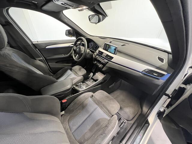 BMW X1 sDrive20i Executive Edition Panoramadak | Trekhaak | Navigatie/Android/Apple Carplay | LM Velgen | Voorstoelen Verwarmd | Achteruitrijcamera | Cruise Control |