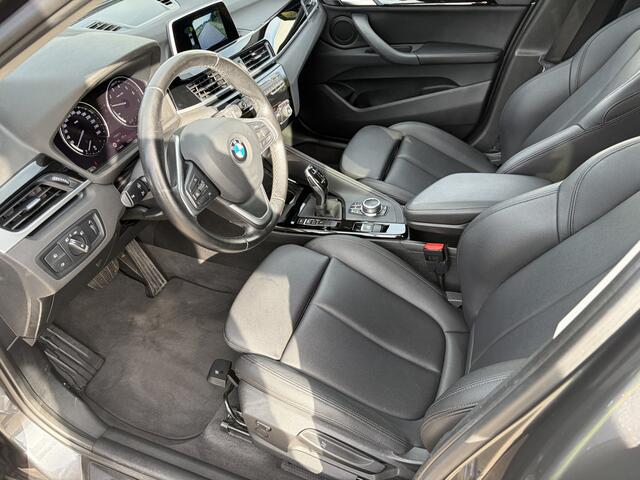 BMW X1 sDrive18i High Executive / AUTOMAAT / NAVI / CAMERA / TREKHAAK / LEER / 113dkm!