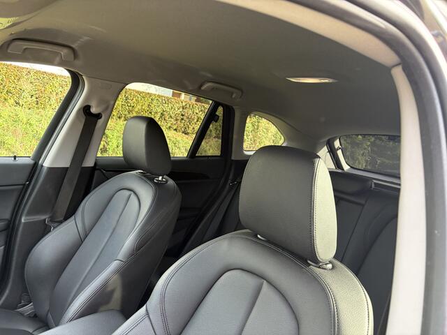 BMW X1 sDrive18i High Executive / AUTOMAAT / NAVI / CAMERA / TREKHAAK / LEER / 113dkm!