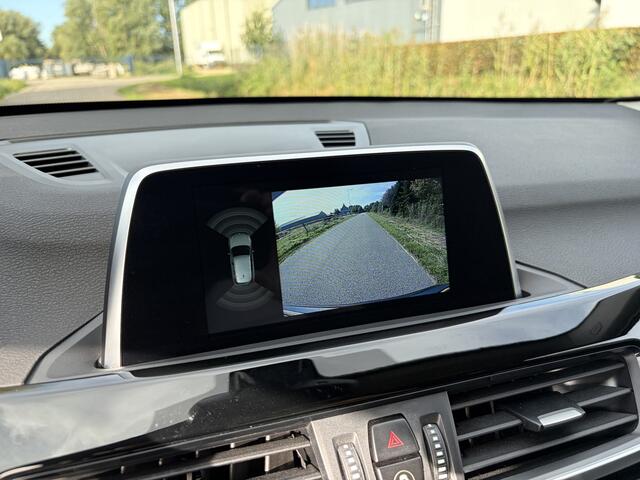 BMW X1 sDrive18i High Executive / AUTOMAAT / NAVI / CAMERA / TREKHAAK / LEER / 113dkm!