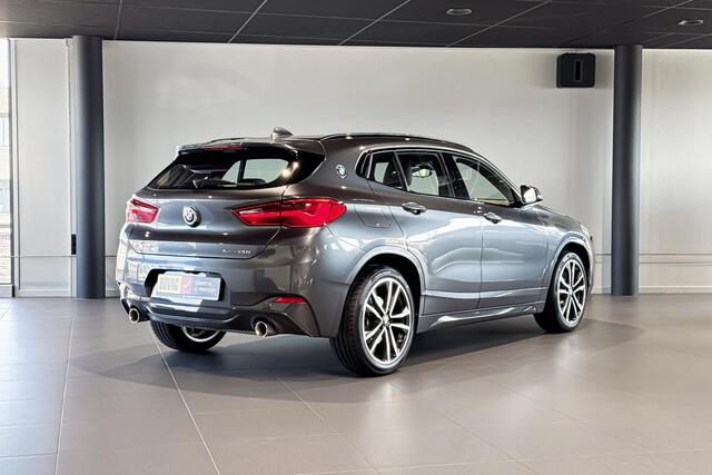 BMW X2 sDrive20i High Executive Edition | M Sport | Glazen Panoramadak | Stoelverwarming | Achteruitrijcamera | Trekhaak |
