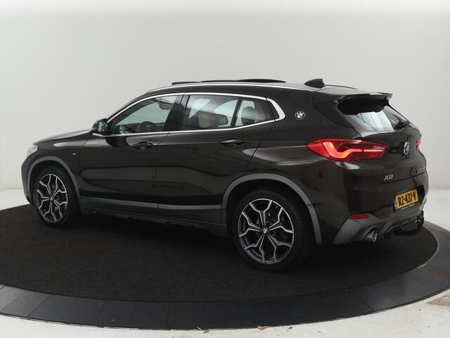 BMW X2 sDrive20i High Executive | Panoramadak | Leder | Stoelverwarming | Cruise control | Head-up | Bluetooth | Sfeerverlichting | Park assist | Elektrische achterklep | Trekhaak