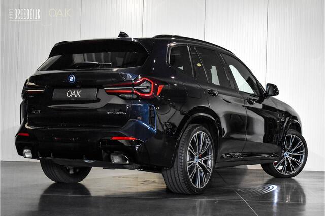 BMW X3 xDrive30e | M-Sport | Live Cockpit | Panorama | Leder | Memory | Trekhaak | Head-Up | Camera | 21"LM | Carbon Zwart