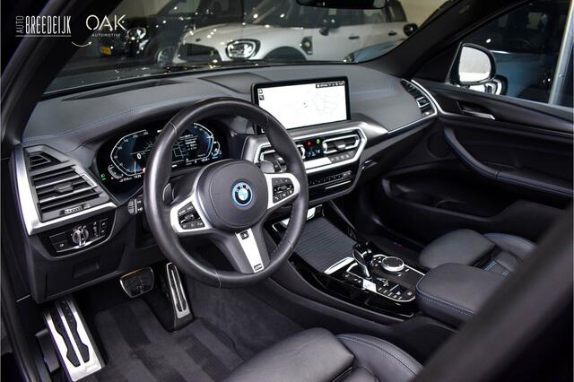 BMW X3 xDrive30e | M-Sport | Live Cockpit | Panorama | Leder | Memory | Trekhaak | Head-Up | Camera | 21"LM | Carbon Zwart