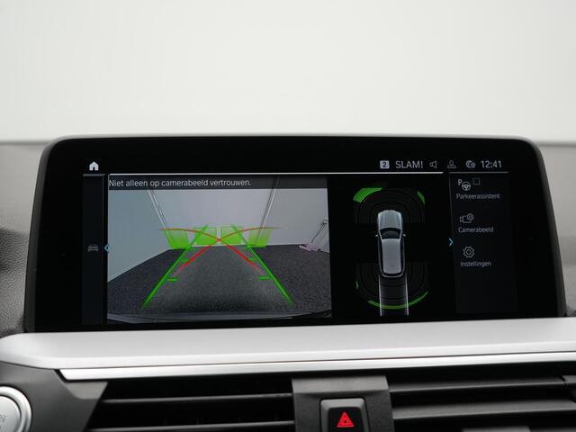 BMW X3 xDrive30e Sportline Plug in Hybrid | PHEV | Trekhaak af Fabriek | Camera | Lederen Sportstoelen Memory | 20"L.M | Apple Carplay | Stuurverwaming | Sfeerverlichting | Navi Prof |