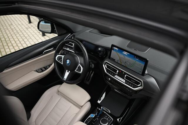 BMW X3 iX3 High Executive / Panoramadak / Adaptief onderstel / Laserlight / Stuurverwarming / Comfort Access / Parking Assistant Plus / Head-Up / Harman Kardon / Stoelverwarming
