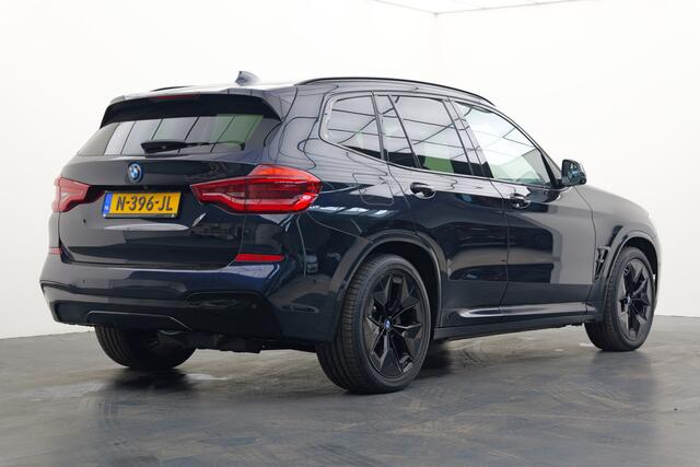 BMW X3 iX3 High Executive 80 kWh | Trekhaak | X3M look | Pano | Leer