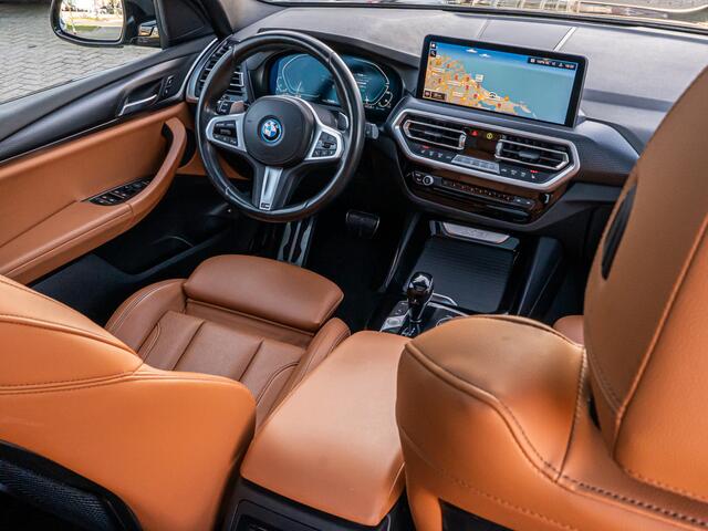 BMW X3 xDrive30e High Exe M-Sport PANO ELEK TREKHAAK LEDER SHADOW CAMERA 20 INCH BOMVOL!