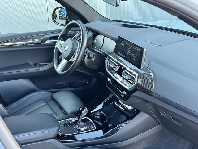 BMW X3 xDrive30e M sport 292 PK | Elek stoelen | Carbon | Laser | Keyless | Brooklyn grau metallic