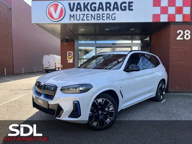 BMW X3 iX3 High Executive M Sport Shadow Line 80 kWh // HUD-DISPLAY // SCHUIF-KANTELDAK // LEDER+ELEK. STOELEN // HARMAN&KARDON AUDIO // ELEK. KLEP// ADAPT. CRUISE // KEYLESS // 360 CAMERA //