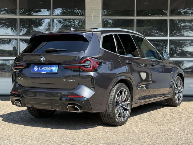 BMW X3 xDrive30e M SPORT | SPORTREMMEN ROOD | PANORAMA | TREKHAAK | ADAPTIEF ONDERSTEL | CAMERA | KEYLESS |