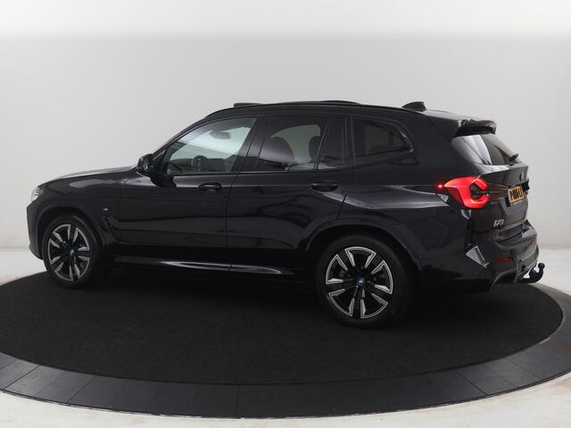 BMW X3 iX3 Executive 80 kWh M-Sport | SOH 94.4% | Panoramadak | Leder | Adaptive cruise | Trekhaak | Carplay | Sfeerverlichting | Memory | Stuur/stoelverwarming | Camera | Park assist |