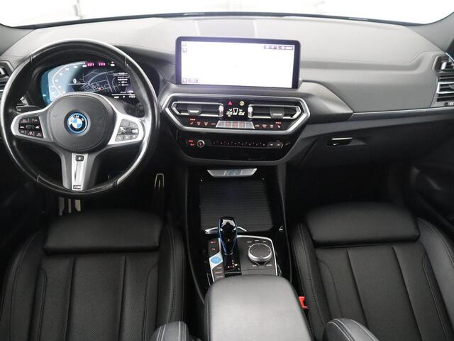 BMW X3 iX3 Executive 80 kWh M-Sport | SOH 94.4% | Panoramadak | Leder | Adaptive cruise | Trekhaak | Carplay | Sfeerverlichting | Memory | Stuur/stoelverwarming | Camera | Park assist |