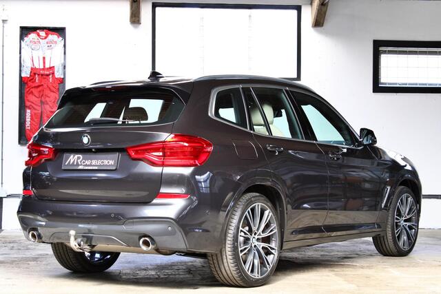 BMW X3 xDrive20i High Executive M Sport | HUD | 21" | Adap. cruise | Trekhaak | Dealer onderhouden